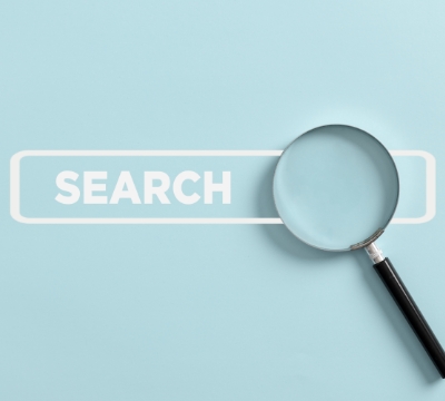 search text with a magnifying glass | understanding SEO and how to excel at search
